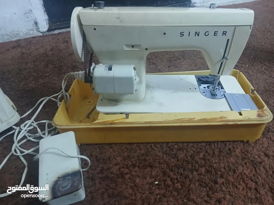 ماكينة خياطة سنجر منزلي