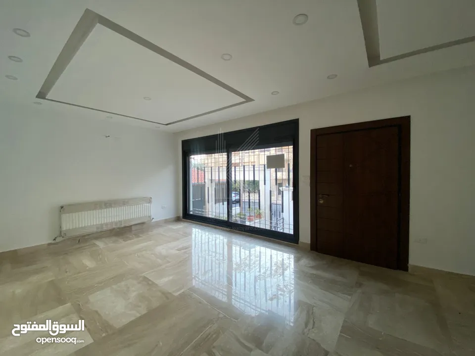 شقة مميزة للبيع في عمان - تلاع العلي - طابق أرضي