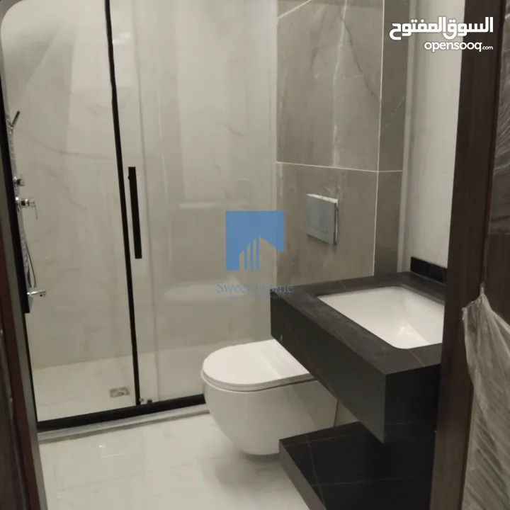 شقة فاخرة للبيع في تلاع العلي  - قرب دوار الواحة طابق اول 95م تشطيب سوبر ديلوكس لم تسكن