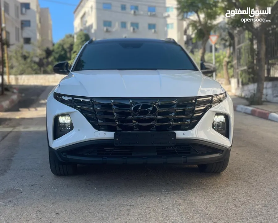 هونداي توسان ( هايبرد)  بنزين + كهرباء  فل الفل اضافات