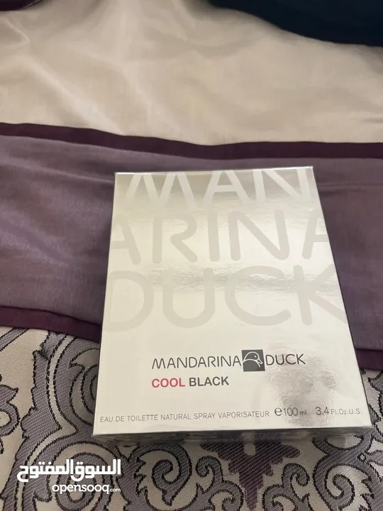 عطر mandarina duck و scalpers the club  الأصلي