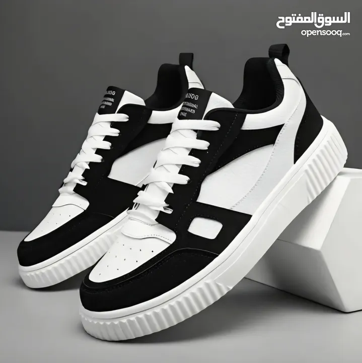 Black and white designer shoes size: 42 negotiable price FREE DELIVERY