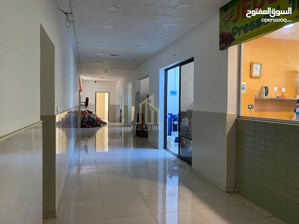في موقع حيوي ومميز في مرج الحمام مجمع تجاري للبيع مكون من خمس طوابق بسعر مغري/ ref 9027