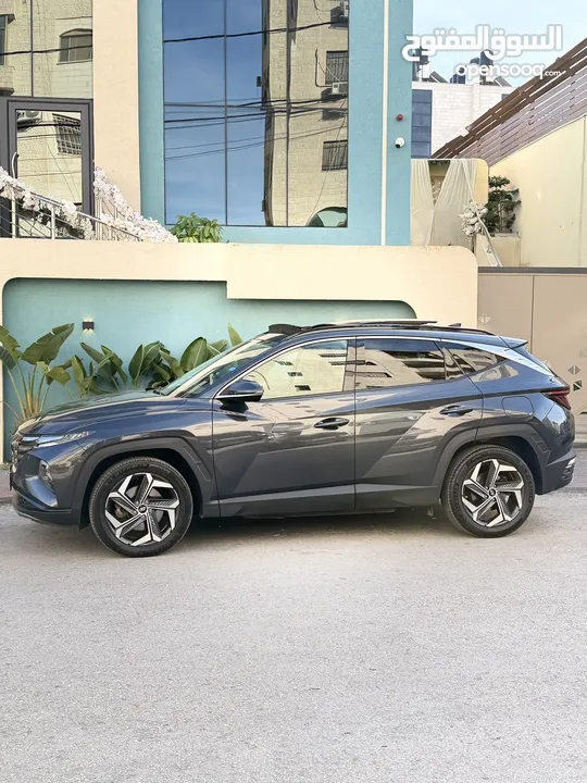 هونداي توسان 2022 هايبرد plug in 4*4 فل اضافات مع بانوراما 271 حصان