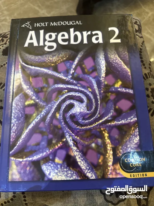 Barely used algebra 2 book, by Holt mcDougal ,common core edition.orginal price 110jd