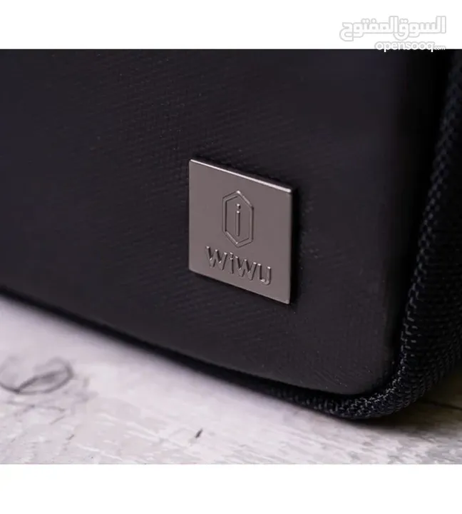 WiWU Metris Travel Pouch – تنظيم أنيق وسهل لأغراضك أثناء السفر