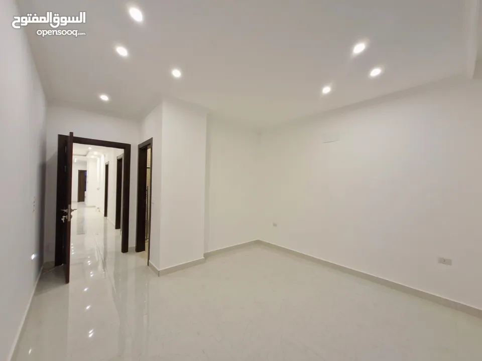 شقة طابق ثاني جديدة ،  مميزة ومطلة للبيع / مساحة (210 - 205 )m2 بأجمل مناطق ضاحية الامير راشد
