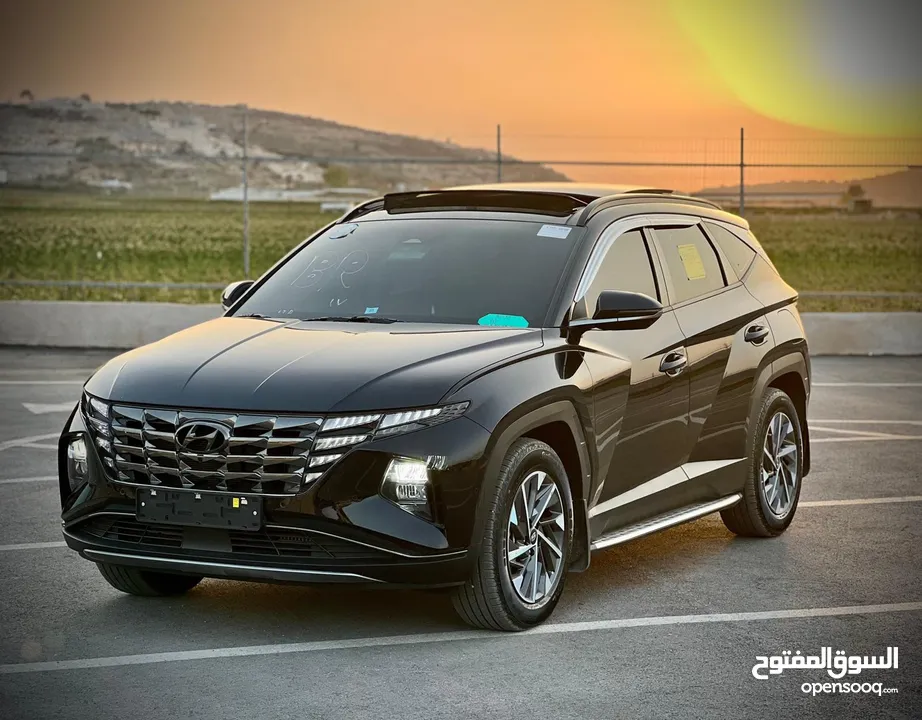 هونداي توسان/2022 فل الفل فتحة سقف بانوراما  2x4 ///240Hp بنزين + كهرباء  ( Haybrid) 1600cc