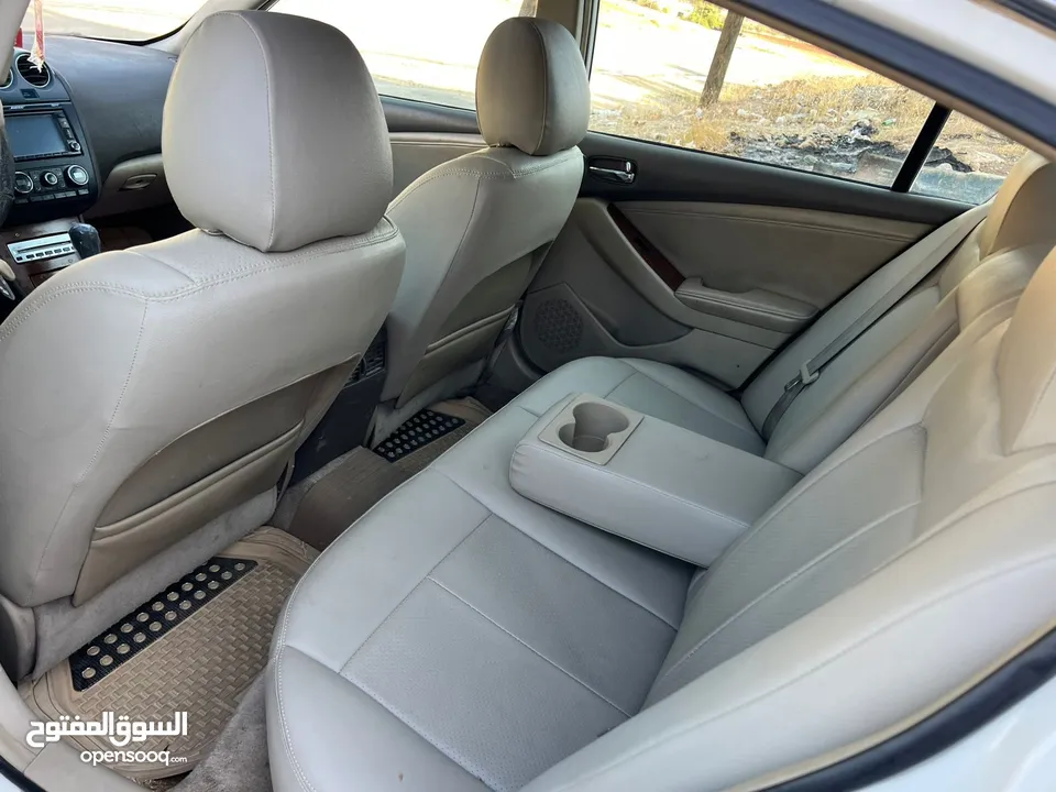 نيسان التيما موديل 2009 فل الفل مع فتحه أعلى مواصفات بحال الوكاله