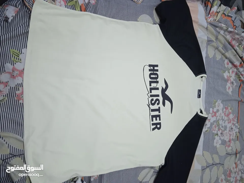 تيشيرت خامه هوليستر لونه بيج في اسود و شيك جدا مقاس XL
