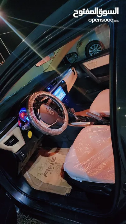 تويوتا كورولا موديل2015 فحص كامل لون فيراني مميزه   وغرفه بيج  مميزه جدا  فحص كامل 7 جيد ملاحظه السي