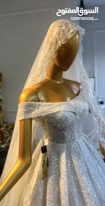 فستان زفاف ايفوري