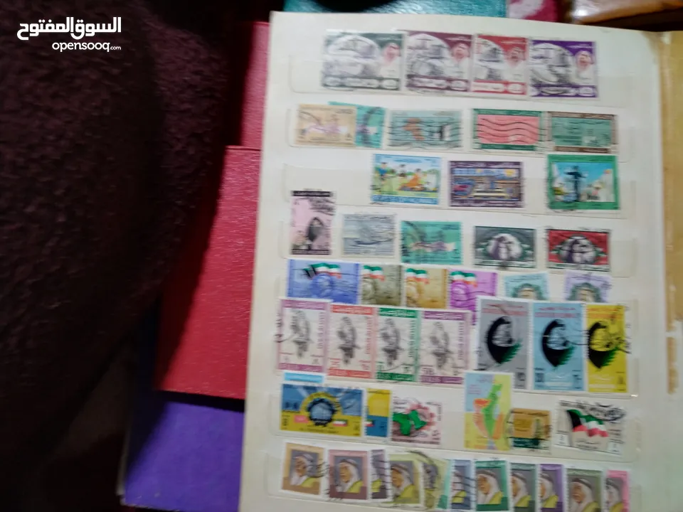 نيشان ملكى وزن41, 41 جرام من الدهب والفضه وعقدفضه من الاحجار الكريمه وطوابع قديمه نادره