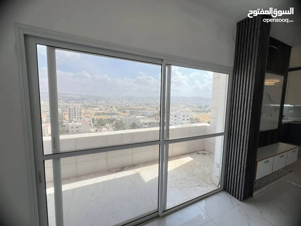 للبيع شقة في خروبه بالقرب من مسجد الفاتح وسط البلد
