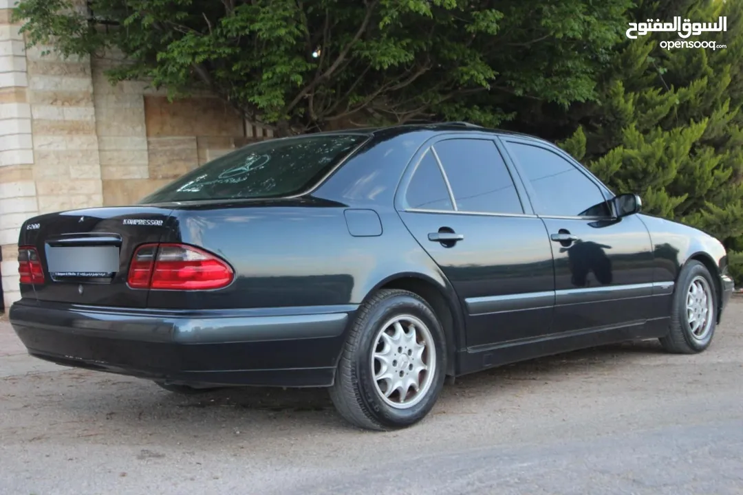 E200. 2002  قرش ونص 2002  رقم الهاتف بالوصف