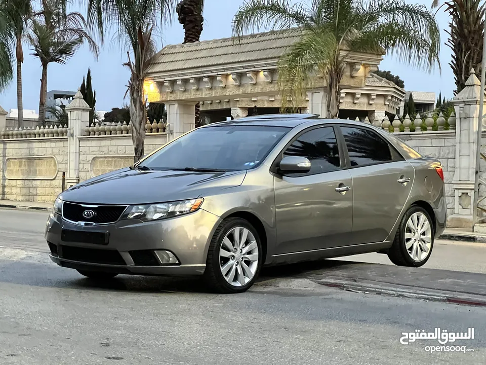 كياااا فورتي 2010 مطور 1600 بنزين جير اتوماتيك فل الفل اضافات سياره بصلاه ع النبي