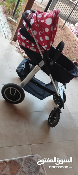 عرباية اطفال شبه جديدة استعمال بسيط جدا جدا بسبب السفر