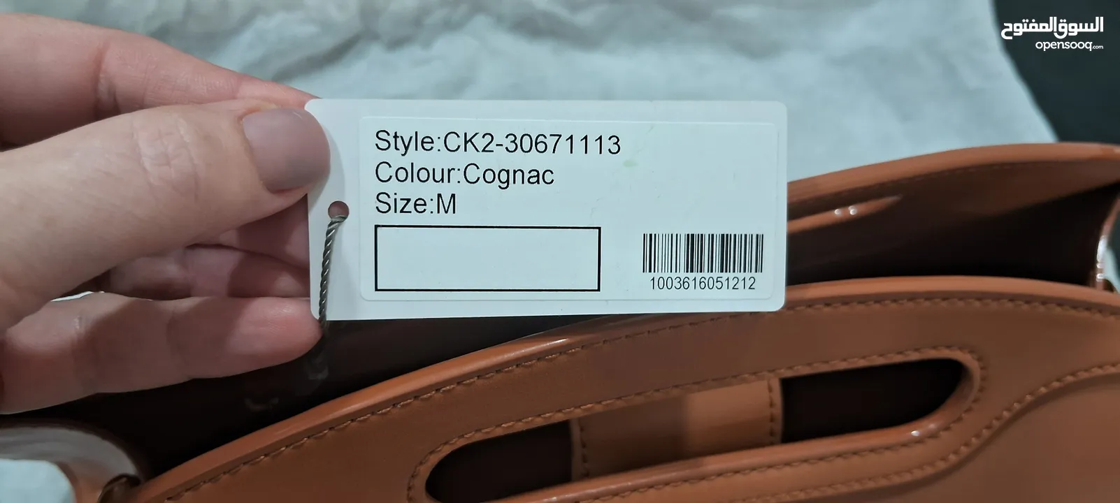 tags on new camel handbag unique with detachable strap