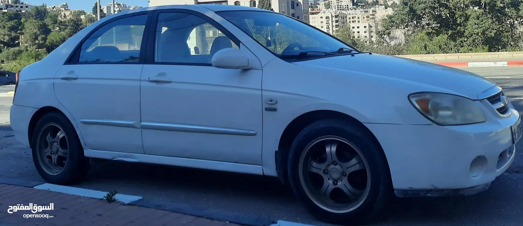 كيا سيراتو 2006 ماتور 1600 اوتومات. دهان اصلي مع تصليح عيوب بسيطة في البودي