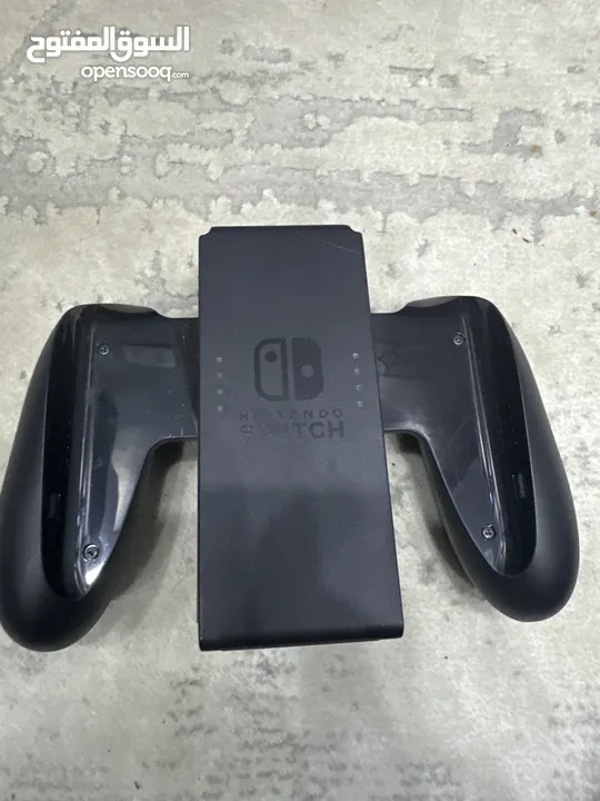 Nintendo switch with controller and 3 games