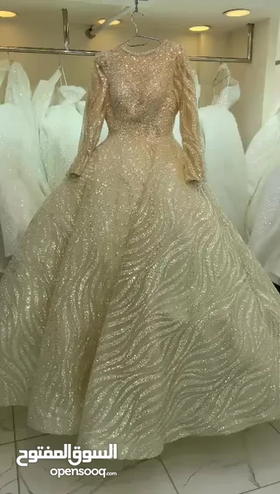 بدلة عرس لبسة وحدة محجبة