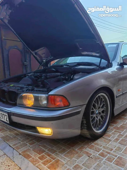 Bmw528i  جلد خمري كربون اصلي