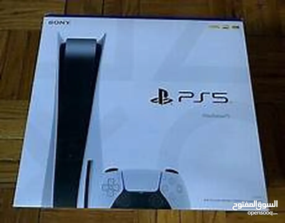 2 month old PS5 with game and extra controller