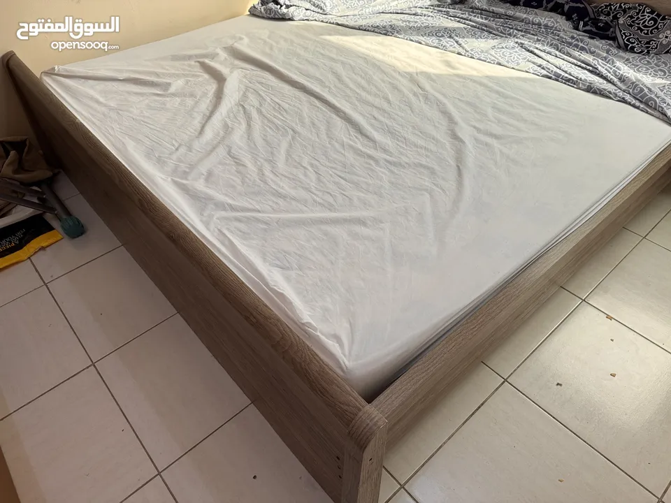 Used King size bed with mattress and drawer