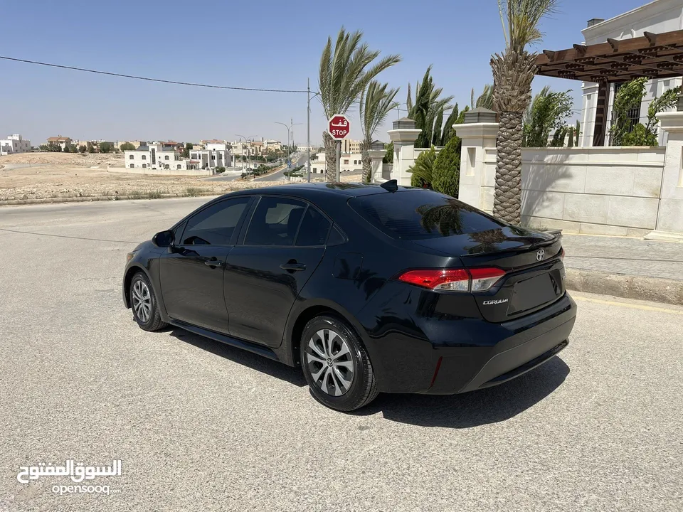 تويوتا كورولا 2020 هايبرد لون اسود حره باسم المستورد
