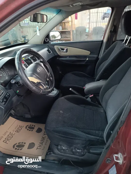 جيب هونداي توسان موديل 2007 ماطور 2000 لون خمري كام لا ينقصه شيئ