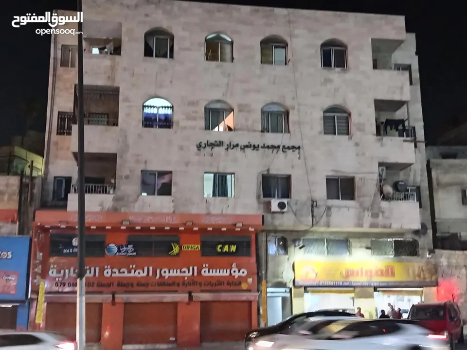 مجمع تجاري و سكني ب دخل سنوي 40-45 الف مؤجر بالكامل