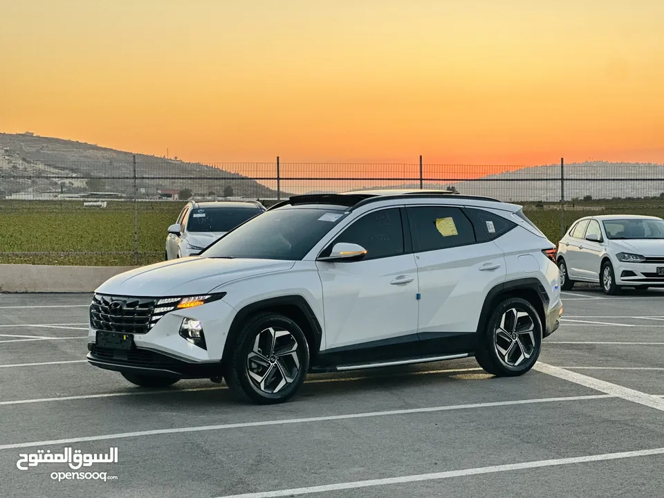 هونداي توسان/2024  فل الفل فتحة سقف بانوراما  2x4 ///240Hp بنزين + كهرباء  ( Haybrid) 1600cc