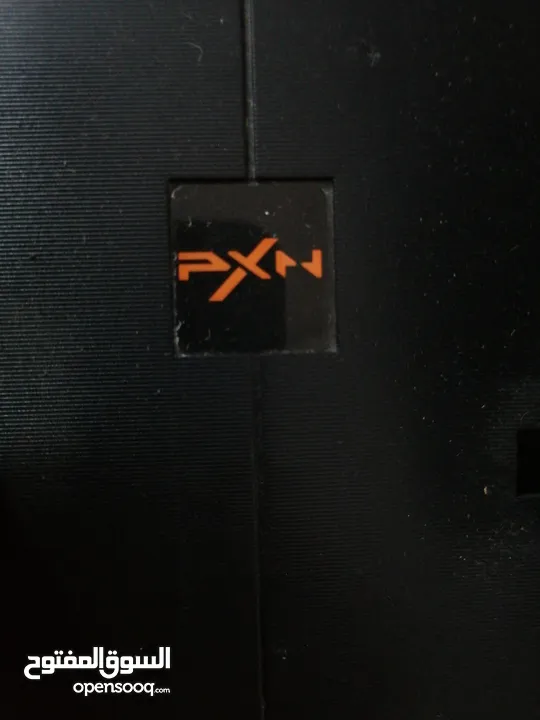 a pxn simulator pack with a steering wheel and a pedals with a gear shifter