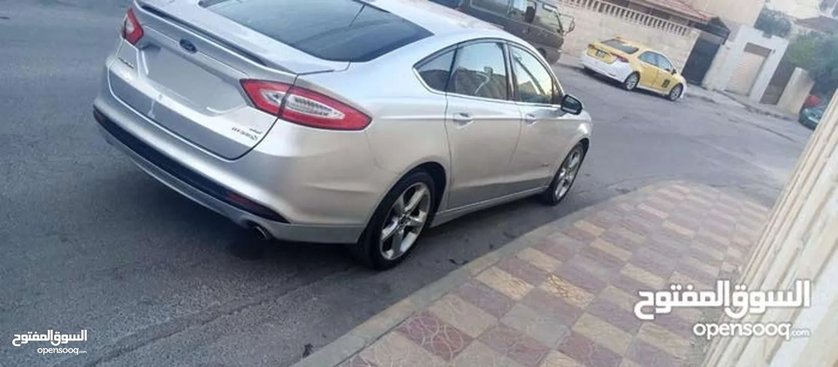 فورد فيوجن 2014 هايبرد كلين فحص كامل لون سلفر بحالة الوكالة