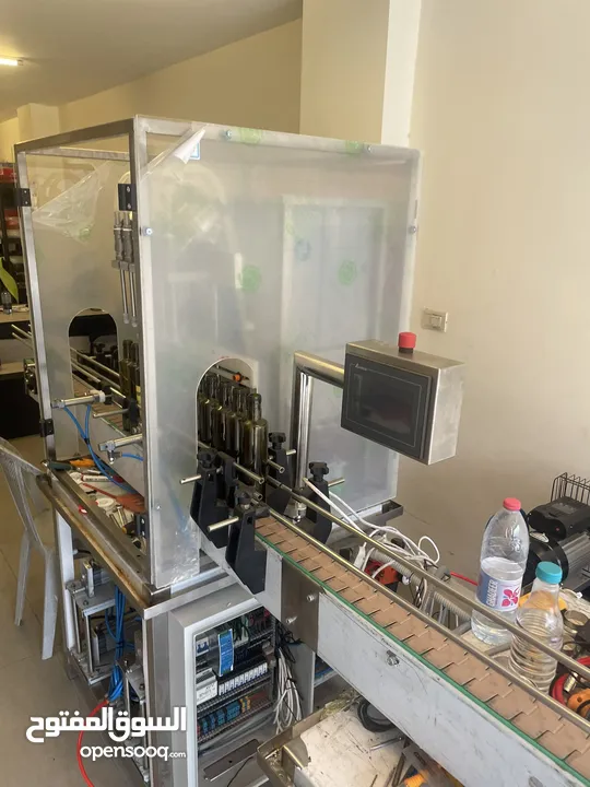 ماكنة تعبئة سوائل Liquids Filling  لأصحاب المصانع والمعامل والمشاريع الصغيرة Machine