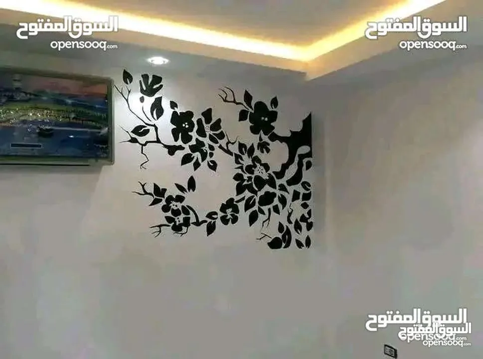 رسام علي الجدران