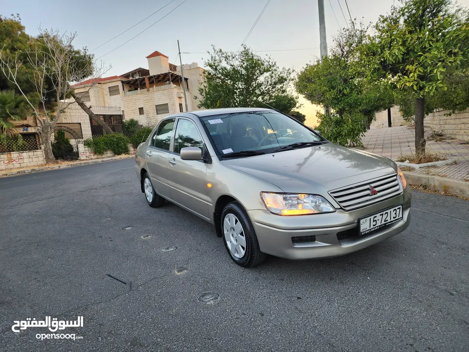 مستوبيشي لانسر 2003 محرك 1300جير عادي قتصادية جدا كاسير 4نجوم فحص كامل بسعر 4700