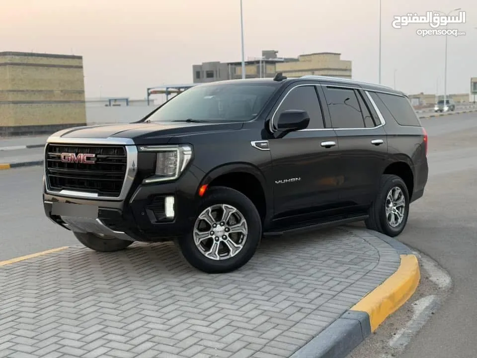 GMC يوكن 2021 مغلفة نانو ب لكامل. ظمان عشر سنوات اصلي  مظللة. بيها كتاب تظليل سيارة طك كارتون