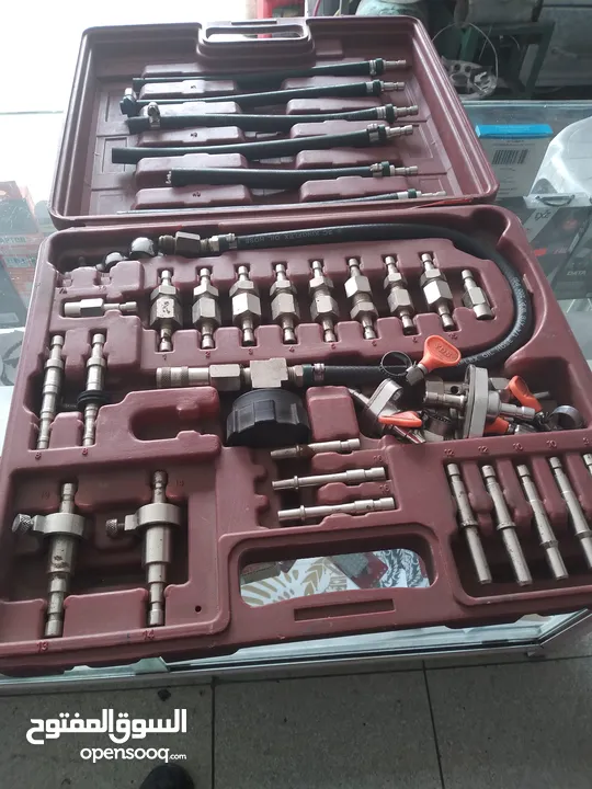 جهاز فحص سيارات  كومبيوتر وجهاز تنظيف بخاخات