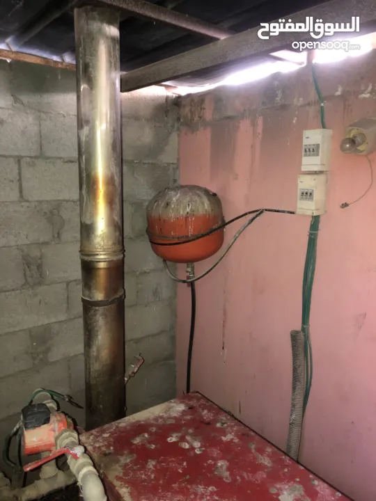 ماطور تدفئة مركزية مع خزان سولار مع الراديترات (المشعاعات)