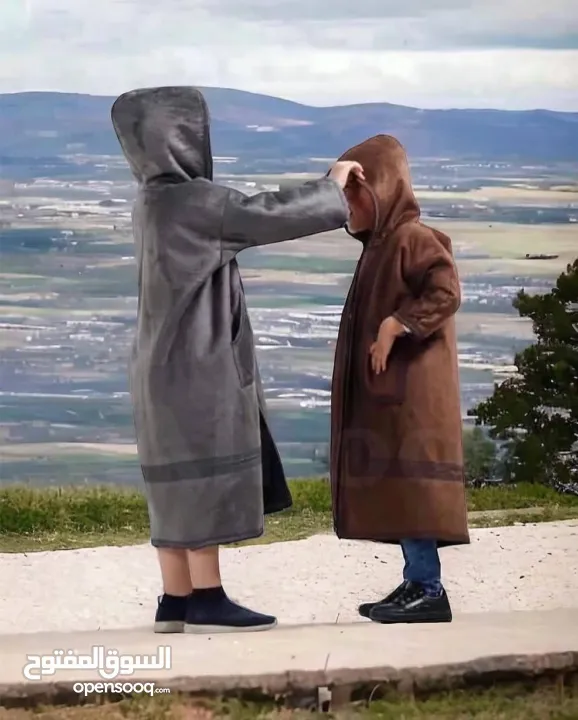 فروة شتوية للأطفال بقبعة مدمجة