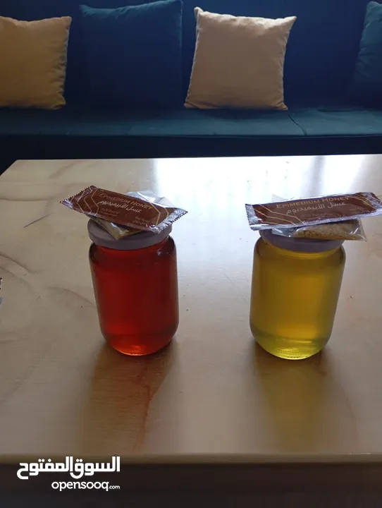 عسل طبيعي 100%  العسل الطبيعي الفاخر الابيض القرغيزي والأسود والأحمر وغذاء الملكات