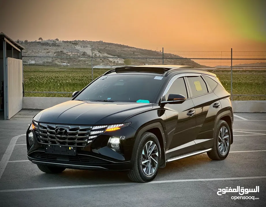 هونداي توسان/2022 فل الفل فتحة سقف بانوراما  2x4 ///240Hp بنزين + كهرباء  ( Haybrid) 1600cc