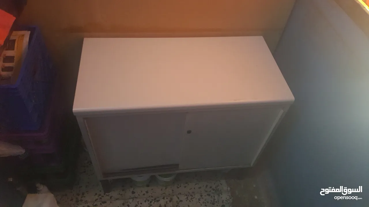 Metal cabinet with granite top going very cheap