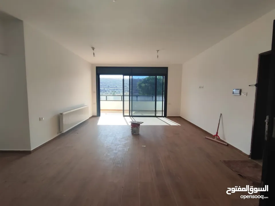 شقة شبه مفروشة للإيجار – عين منجد، شارع إسكان المهندسين