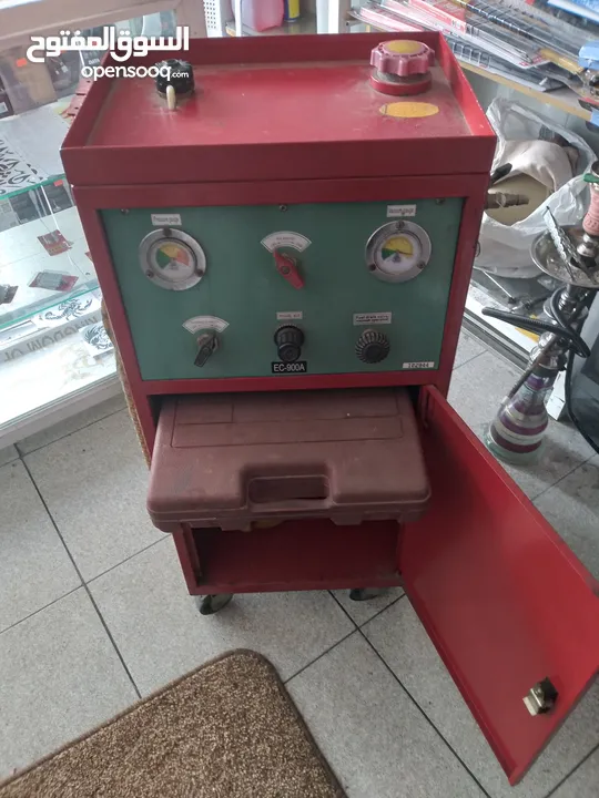 جهاز فحص سيارات  كومبيوتر وجهاز تنظيف بخاخات