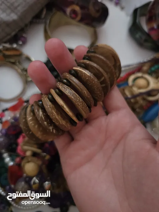أساور خشب وواحدة حديد (بني أزرق ملون)