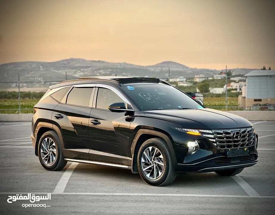 هونداي توسان/2022 فل الفل فتحة سقف بانوراما  2x4 ///240Hp بنزين + كهرباء  ( Haybrid) 1600cc