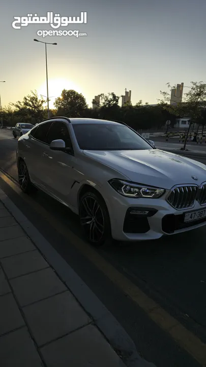 BMW X6 X DRIVE 400i 2022بحالة الوكالة