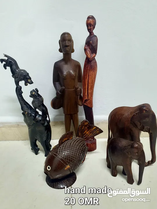 Various collection of decorative items. Wooden, crystal, metallic, glass and sculptures.